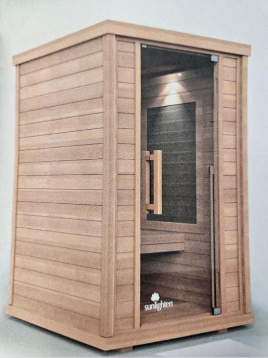 A cedar Sunlighten sauna with a glass door